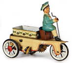 STOCK boy on a tricycle, 11 cm, sheet metal, pre-war era, coil spring mechanism is intact, slightly