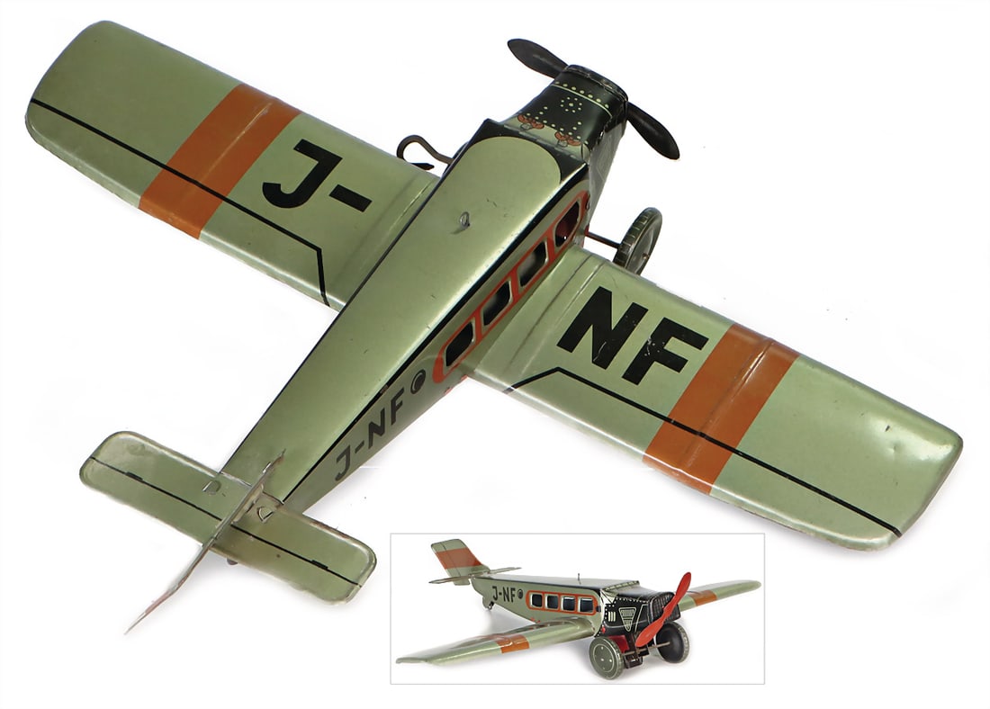 JNF prop plane, 31.5 cm, sheet metal, lithographed, very good condition, clock mechanism is intact (1 of 1)