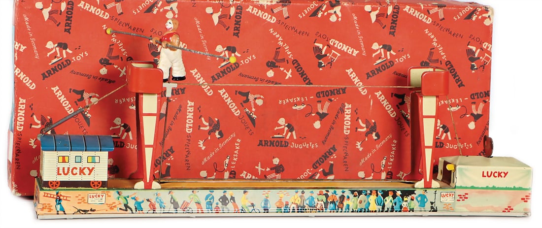 ARNOLD LUCKY, turning railway, pre-war era, clown on a wire rope, lithographed sheet metal, clock (1 of 2)