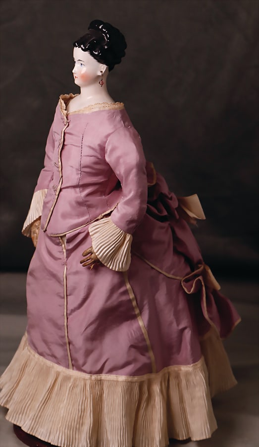China-Head, glazed porcelain, shoulder headed doll, c. 1870, 41 cm, German, fine modelled hair with: China-Head, glazed porcelain, shoulder headed doll, c. 1870, 41 cm, German, fine modelled hair with hair ring, blue painted eyes, closed mouth, pierced ears, leather body with single stitched down fin