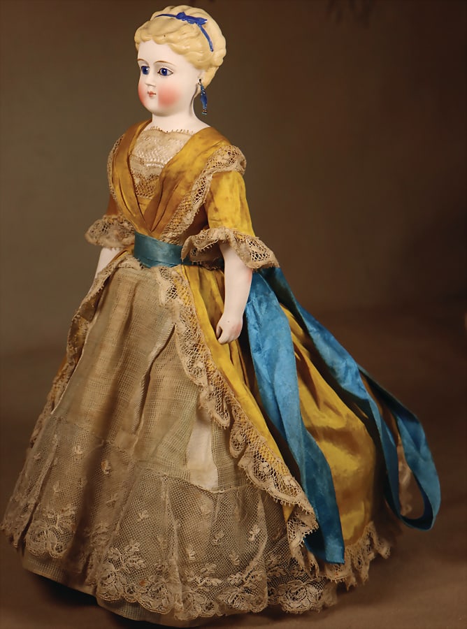 Parian, bisque porcelain shoulder headed doll, modeled blond, pinned-up hair, modelled blue bisque: Parian, bisque porcelain shoulder headed doll, modeled blond, pinned-up hair, modelled blue bisque hairband, fix inset almond-shaped blue glass eyes, closed mouth, blushed cheeks, pierced ears, bisque