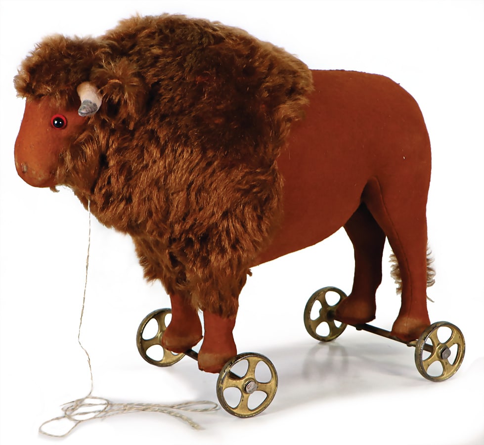 STEIFF bison, produced 1914, item No. 1128, with button, block letters, long trailing f, on cast (1 of 4)