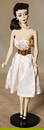 MATTEL Barbie (Barbie No. 3, brunette), with outfit and  swimsuit, 1 arm is a bit bleached out,