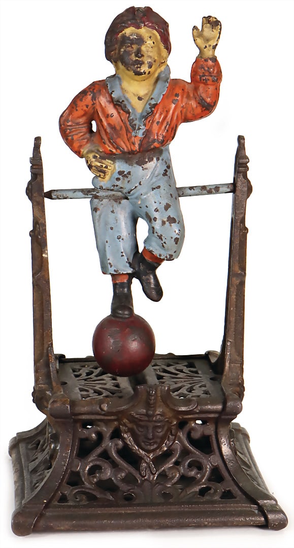 Moneybank, metal casting, boy at the horizontal bar, USA, h: 26 cm, age-appropriate paint defect: Moneybank, metal casting, boy at the horizontal bar, USA, h: 26 cm, age-appropriate paint defect German Description Moneybank, Metallguss, Junge am Reck, USA, H: 26 cm, altersbed. Lackfehler
