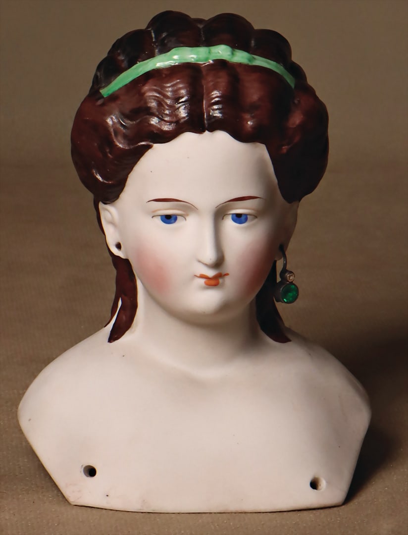 bisque porcelain shoulder headed doll, ladylike head, dark brown model. curly hair with green (1 of 3)