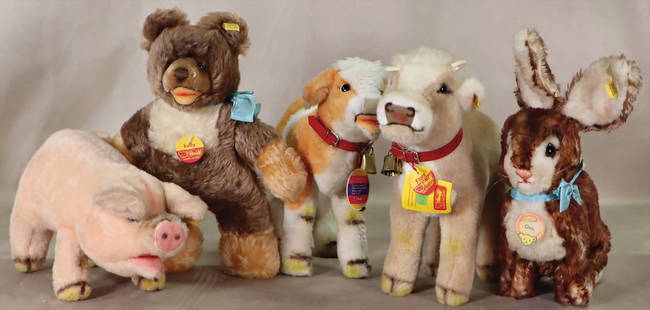 STEIFF mixed lot post-war, Cosy Kälble, complete, no. 5180/28, Ossy, complete, no. 2940/23,: STEIFF mixed lot post-war, Cosy Kälble, complete, no. 5180/28, Ossy, complete, no. 2940/23, Cosy Piggy, complete, no. 1620/00, Flora, golden button, yellow flag, no. 3792/25, Lully, complete,