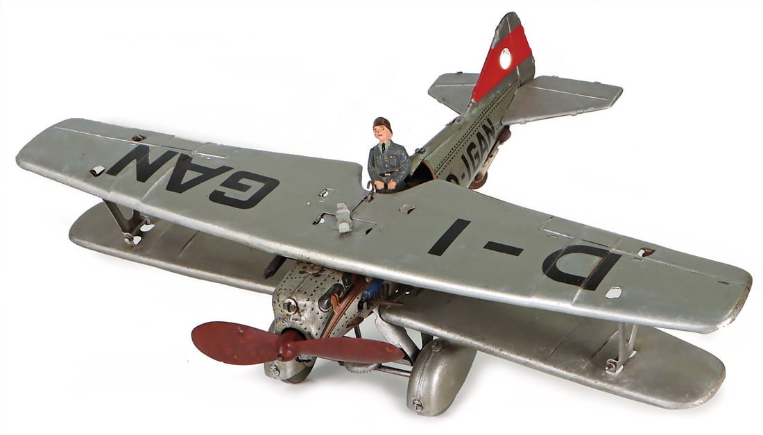 Fighter plane, biplane D- IGAN, sheet metal, lithographed, clockwork intact, 24 cm   German (1 of 2)