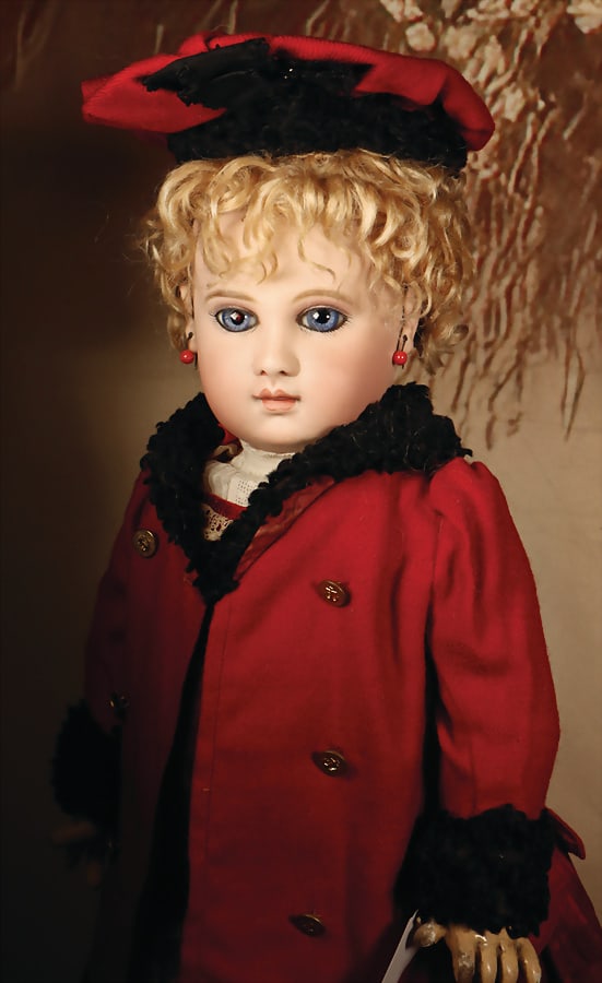 EMILE JUMEAU Expressive portrait of Bébé by Emile Jumeau with cornflower blue eyes bisque: EMILE JUMEAU Expressive portrait of Bébé by Emile Jumeau with cornflower blue eyes bisque porcelain movable head, cornflower blue firmly set paperweight eyes, delicate eye shadow, closed mou