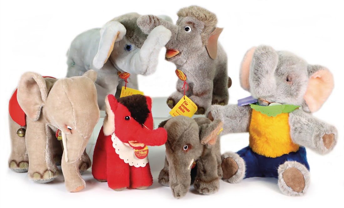 STEIFF Conv. post-war, HATHI, with shield, item no. 0382/ 22, archive trailer: 1979, DIGGI, with: STEIFF Conv. post-war, HATHI, with shield, item no. 0382/ 22, archive trailer: 1979, DIGGI, with shield, item no. 6431/ 18, archive trailer: 1973, elephant, complete, item no. 6322, 0, archive trailer