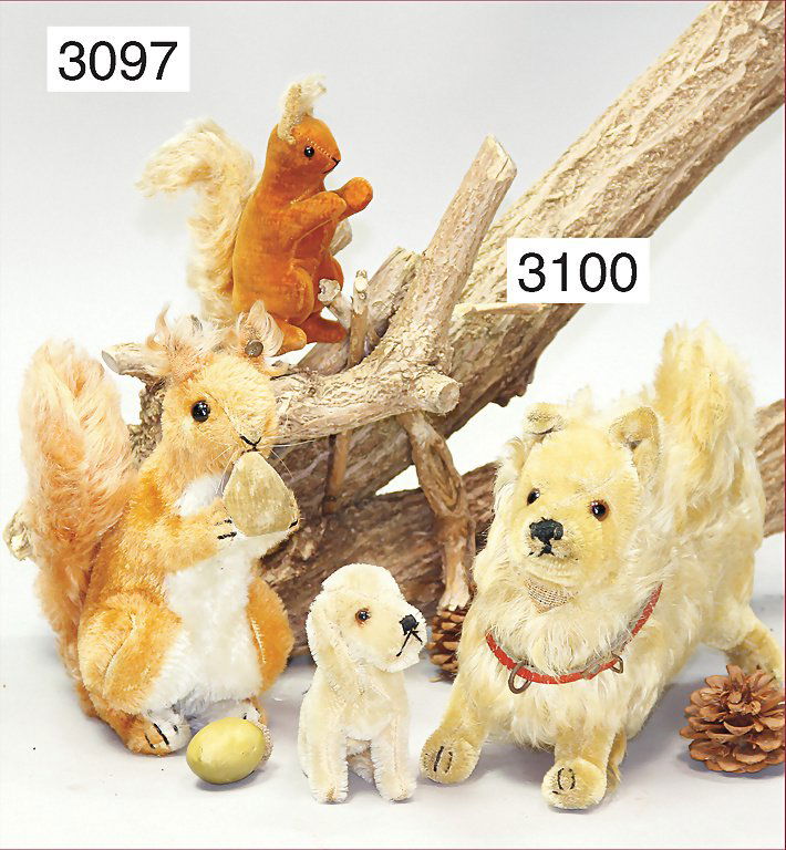 STEIFF, mixed lot pre-war era, spitz with button, long : STEIFF, mixed lot pre-war era, spitz with button, long stretched F, long mohair, a little bit yellowed, standing height 17 cm, slightly worned, with leather collar, with a Treff with button, long stre