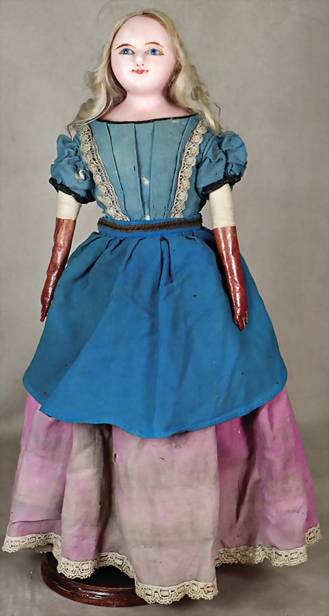 Wax covered papier mâché shoulder headed doll, 52 cm, blue fixed glass eyes, inset. glass: Wax covered papier mâché shoulder headed doll, 52 cm, blue fixed glass eyes, inset. glass eyes, inset mohair mohair, tension cracks in the face, fabric body, leather arms German Description