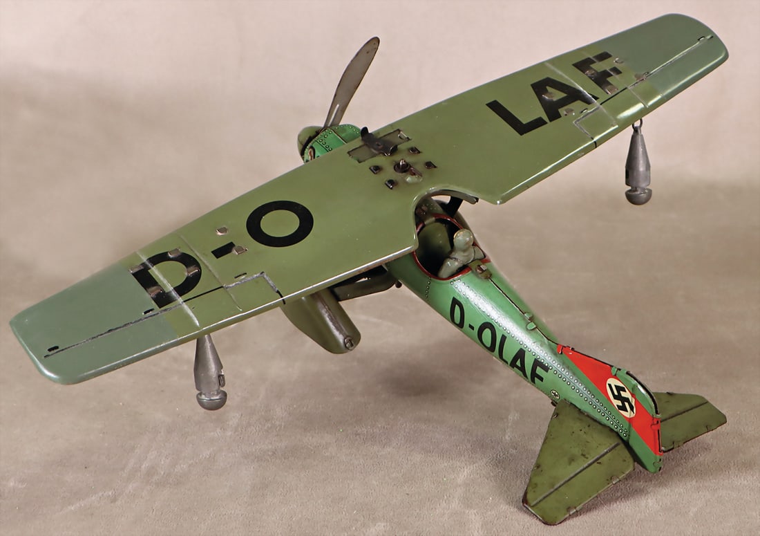 Fighter plane, WW2 D-OLAF, sheet metal, litho, with pilot, clockwork defective, used condition (1 of 1)