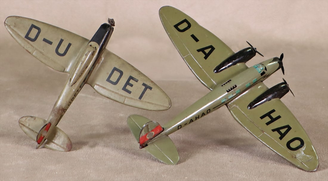 fighter plane, sheet metal, litho, D-AHAO, Lehmann handle, length 13cm, color partly retouched,: fighter plane, sheet metal, litho, D-AHAO, Lehmann handle, length 13cm, color partly retouched, fighter plane D-UDET, sheet metal, litho, Lehmann handle, 11cm, at some places slight rust, number 817, 