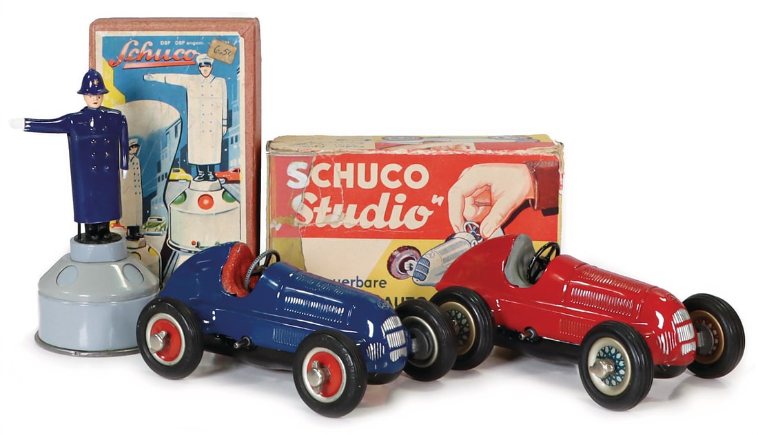 SCHUCO Flic 4520, English protection man, h: 13 cm, in original cardboard box, clock mechanism (1 of 1)