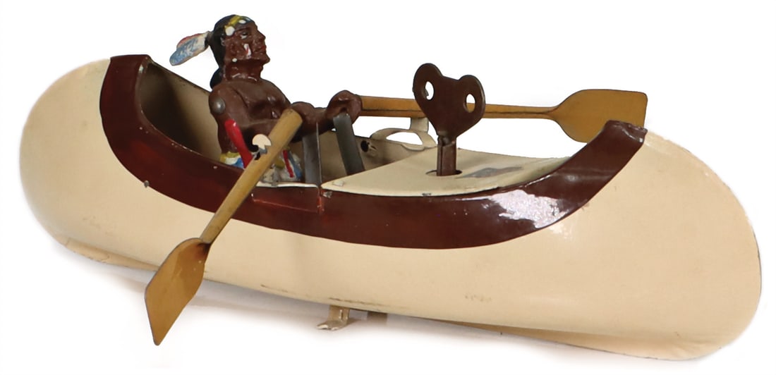 Indian, mass, in a kayak, tin, 21,5 cm, clockwork intact, good condition. German Description (1 of 2)