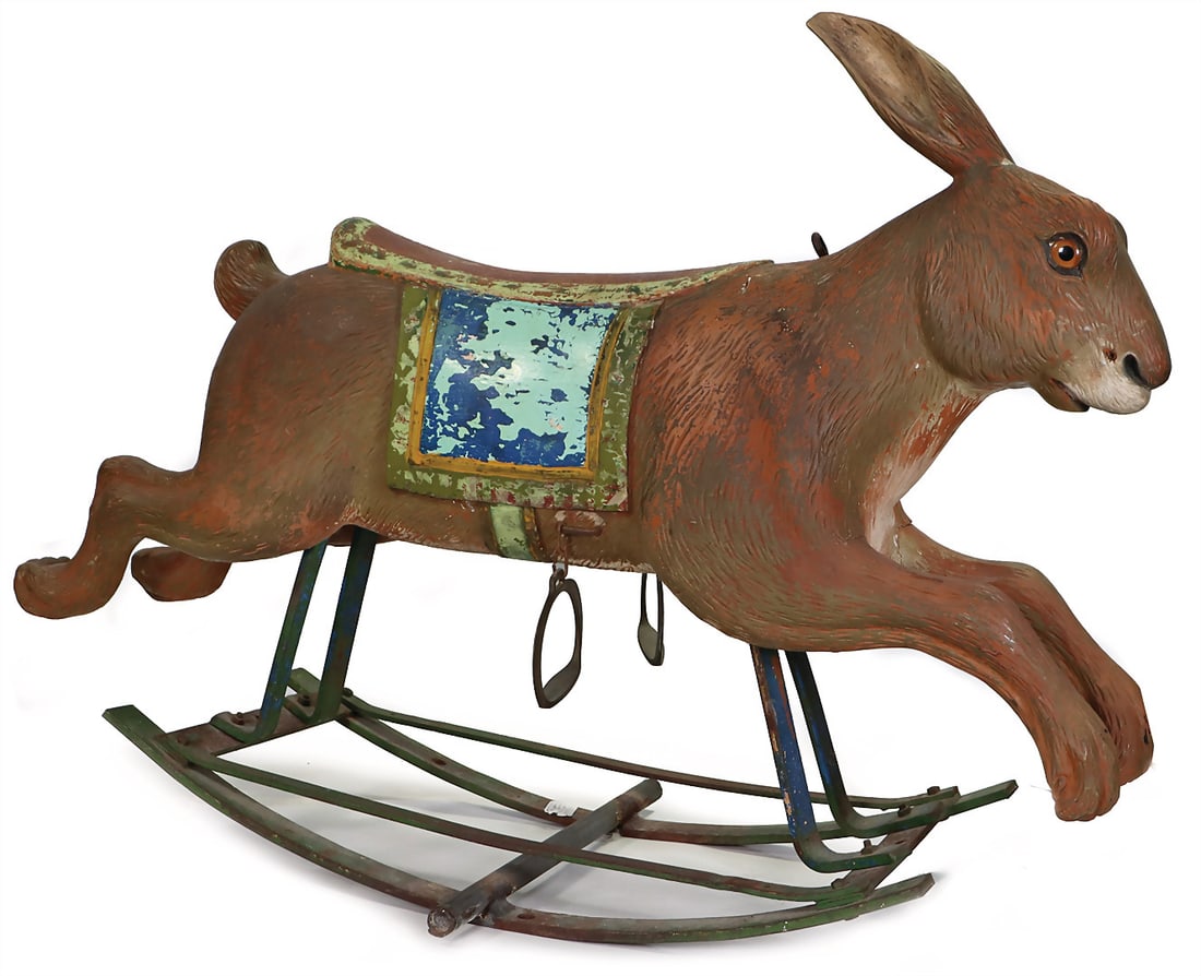 Hare, wood/mass, approx. 100 cm. Glass eyes, finely worked, with saddle and stirrups, with seesaw, (1 of 2)