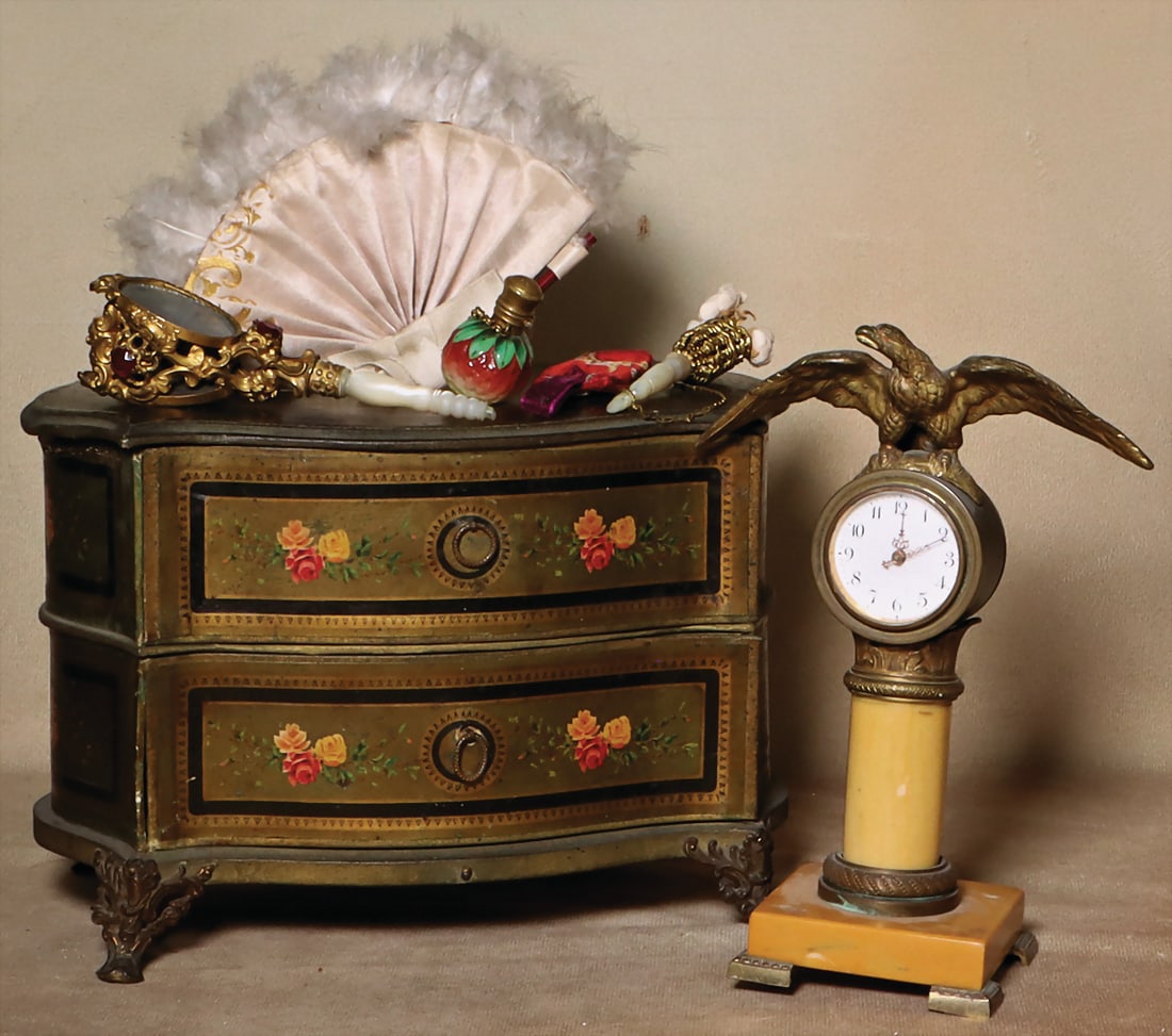 Chest of drawers, pressed cardboard, lithographed, cast metal feet, h: 16 cm, clock, h: 19.5 cm, (1 of 1)