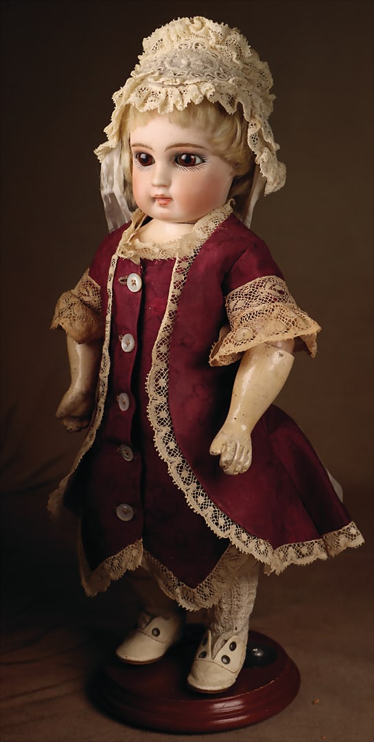 Rare early bisque doll, probably Ernst Grossmann, c. 1882, rotatable flattened bisque full head, (1 of 2)