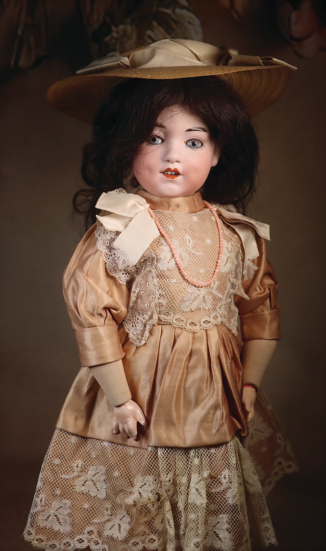 HEUBACH , circa 1915, rosé-tinted bisque porcelain crank-head doll with light blue glass (1 of 6)