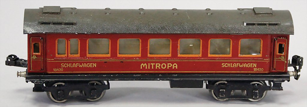 MÄRKLIN 1843, Mitropa Schlafwagen, 29,5 cm, rot,: MÄRKLIN 1843, Mitropa Schlafwagen, 29,5 cm, rot, 4-achsig, bespielt, altersbed. Lackfehler, ohne Schilder