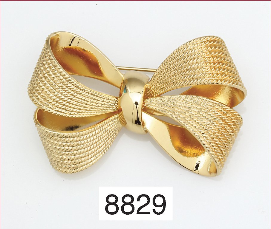 Goldfarbenes, Schleifenbrosche von Grosse (Henkel &: Goldfarbenes, Schleifenbrosche von Grosse (Henkel & Grosse,Pforzheim), signiert, in Originalverpackung, L = 51,5 mm