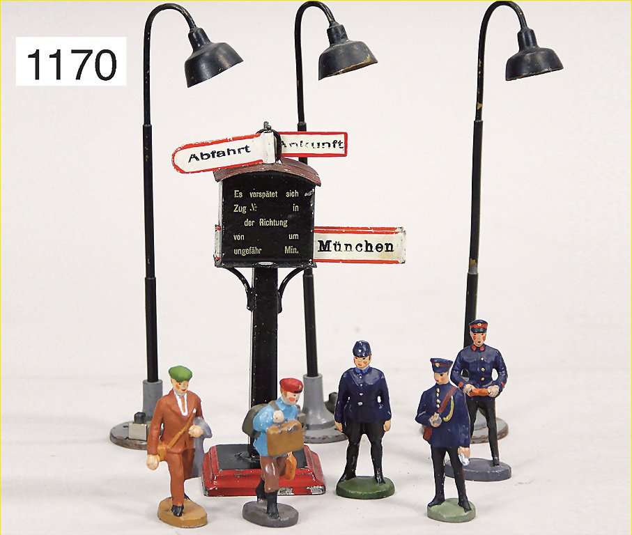 MÄRKLIN direction display, sheet metal, varnished,: MÄRKLIN direction display, sheet metal, varnished, height 13 cm, with 5 pieces railway figures, lead/casting, 3 street lamps, suitable to track 0 German Description MÄRKLIN Richtungsanzeiger, Blech,