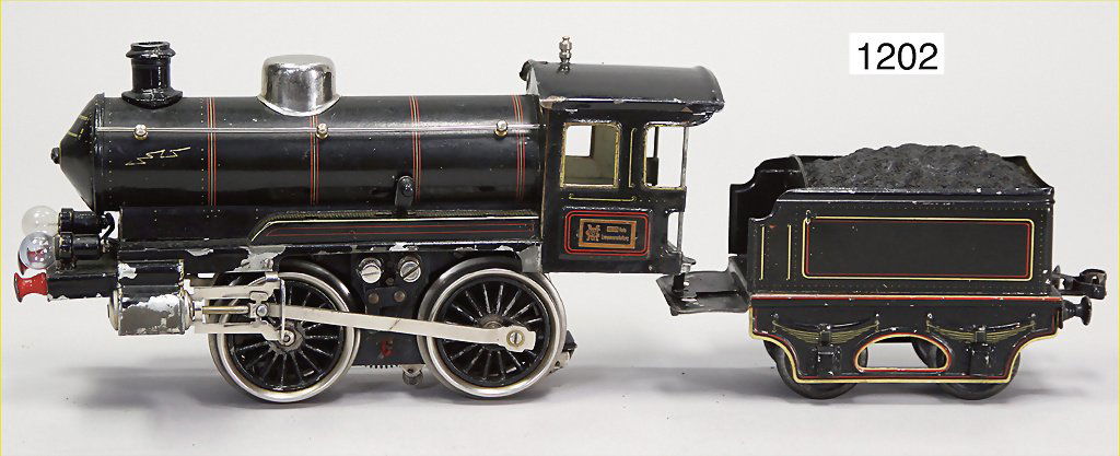 MÄRKLIN track 1, steam locomotive with separate tender: MÄRKLIN track 1, steam locomotive with separate tender B, black, with red and yellow ornamental lines, electrical version, used, with scratches on the paintwork German Description MÄRKLIN Spur 1, Sc