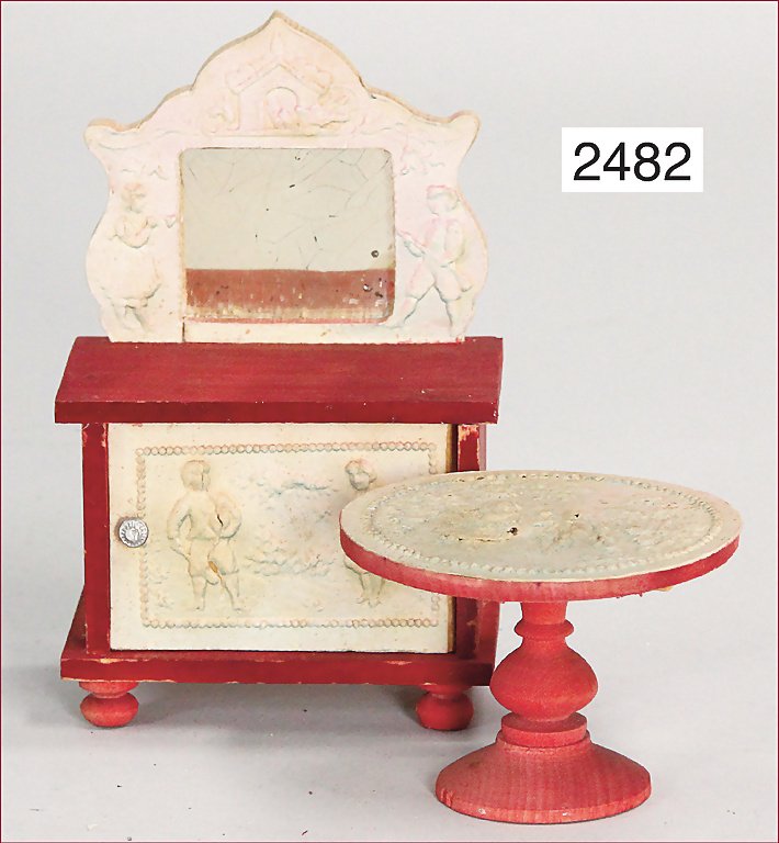 2 pieces dollhouse furniture, table, with a diameter of: 2 pieces dollhouse furniture, table, with a diameter of 7 cm, stamped pressed cardboard, 2 small patches with flaws, with 1 suitable chest of drawers, with mirror German Description 2 Teile Puppenstub