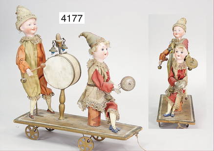 ZINNER pull game, 2 biscuit porcelain socket head doll,: ZINNER pull game, 2 biscuit porcelain socket head doll, doll in front with fix inset blue glass eyes, opened mouth, line of upper teeth, 21 cm tall (seat height), wood /wire body, back doll standing 2