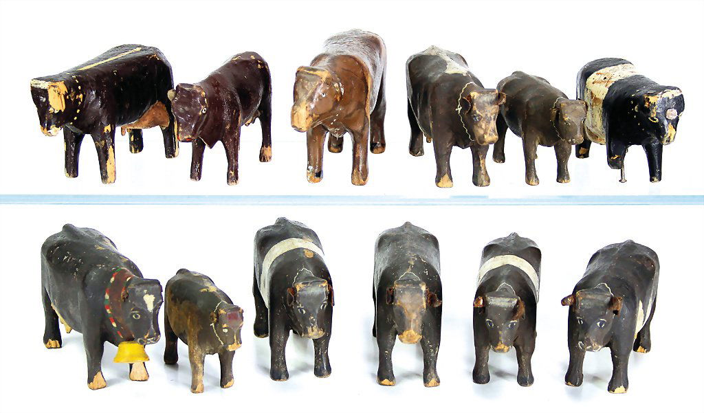 12 pieces cows, wood, 1880 - 1900, good condition,: 12 pieces cows, wood, 1880 - 1900, good condition, flaked off paint part, ears, teats and tails are partly missing, some legs are broken German Description 12 Teile Kühe, Holz, 1880 - 1900, guter Zus