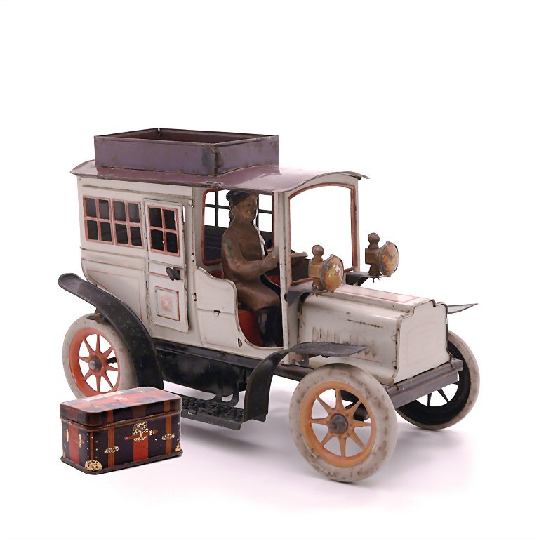 Günthermann, Siegfried saloon, sheet metal, around: Günthermann, Siegfried saloon, sheet metal, around 1910, 145 x 220 x 120 mm, good, functioning condition, used, in places rusty, with scratches on the paintwork, with suitcase, Seymour, marked "TMS",