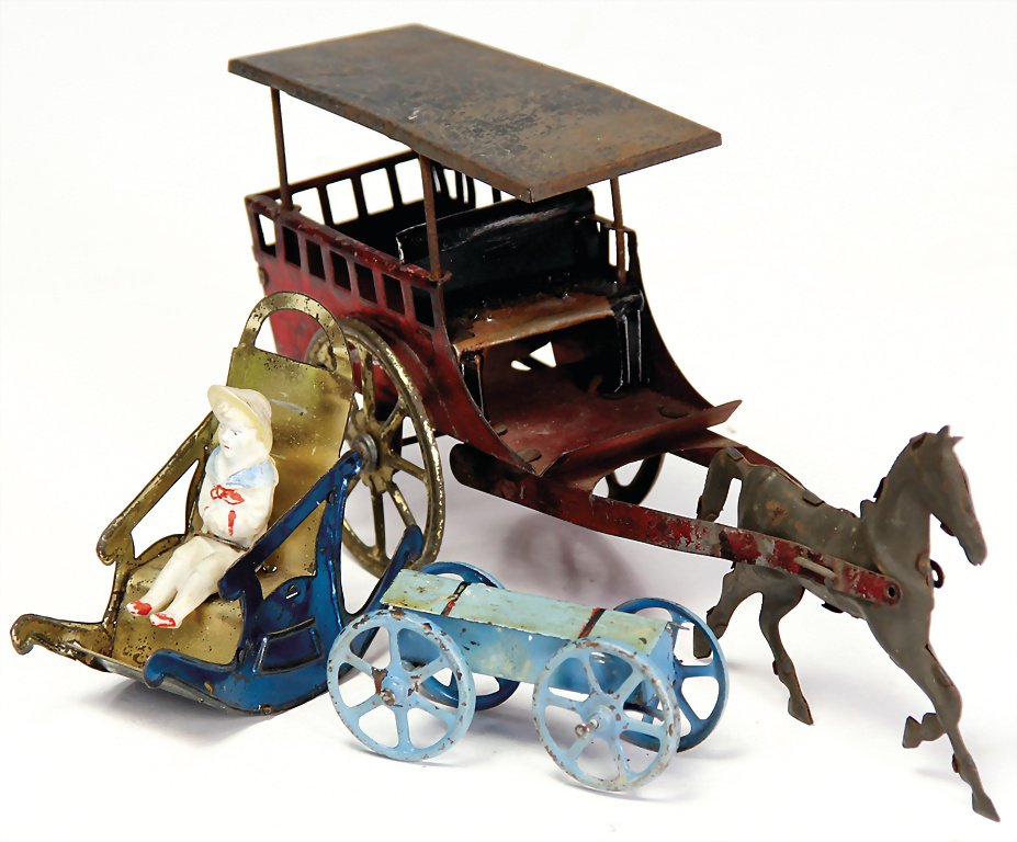 ammunition car, sheet metal, 1900 - 1910, 30 x 70 x 38: ammunition car, sheet metal, 1900 - 1910, 30 x 70 x 38 mm, wheels are a little bit bent, rocking chair doll (Penny Toy), sheet metal, biscuit porcelain, around 1910, 70 x 85 x 35 mm, horse and cart (P