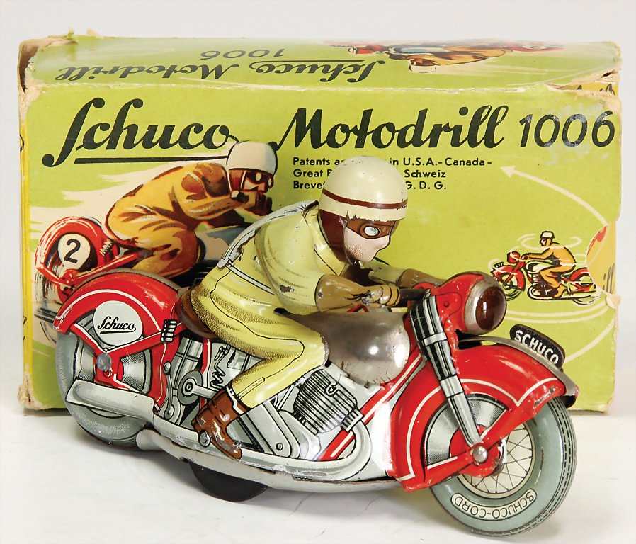 SCHUCO Motodrill 1006, lithographed sheet metal, 12.5: SCHUCO Motodrill 1006, lithographed sheet metal, 12.5 cm, slightly used, clock mechanism is intact, good condition, in original box German Description SCHUCO Motodrill 1006, Blech lithogr., 12,5 cm, l