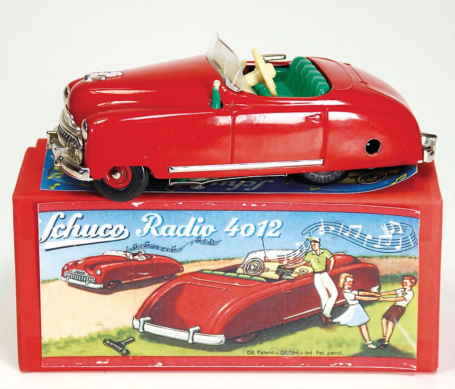 SCHUCO radio 4012, 15.5 cm, clock mechanism is intact,: SCHUCO radio 4012, 15.5 cm, clock mechanism is intact, small tear at the windshield, box is a reproduction, slightly used, good condition German Description SCHUCO Radio 4012, 15,5 cm, Uhrwerke intakt