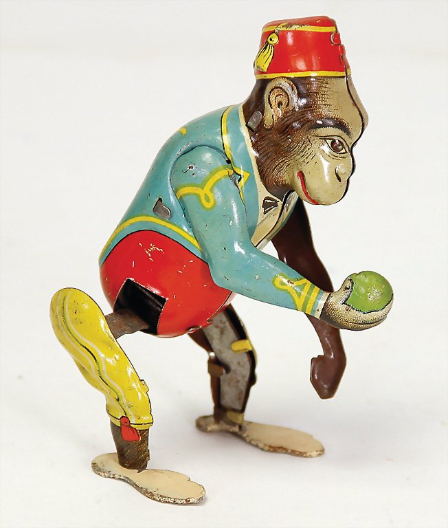 KÖHLER monkey with ball, sheet metal, lithographed, 8.5: KÖHLER monkey with ball, sheet metal, lithographed, 8.5 cm, good condition, clock mechanism is intact German Description KÖHLER Affe mit Ball, Blech, lithogr., 8,5 cm, guter Zust., Uhrwerk intakt