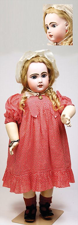 JUMEAU French Bebe, biscuit porcelain socket head, real: JUMEAU French Bebe, biscuit porcelain socket head, real hair wig, blue fix standing Paperweight eyes, opened mouth, line of upper teeth, glued on porcelain ears, pierced, with a hairline crack at the 