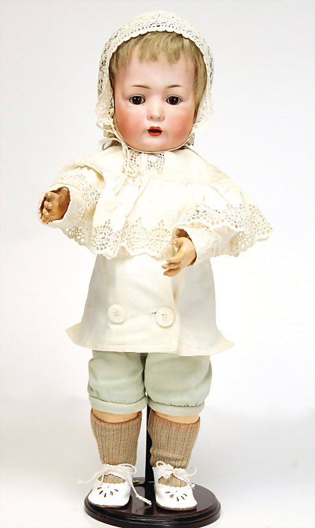 BRUNO SCHMIDT doll with porcelain socket head, marked: BRUNO SCHMIDT doll with porcelain socket head, marked 2097-5, 48 cm, brown sleepy eyes, opened mouth, teeth, tongue, toddler body, old mohair wig, a little bit losing, minimally wig pull, old clothes
