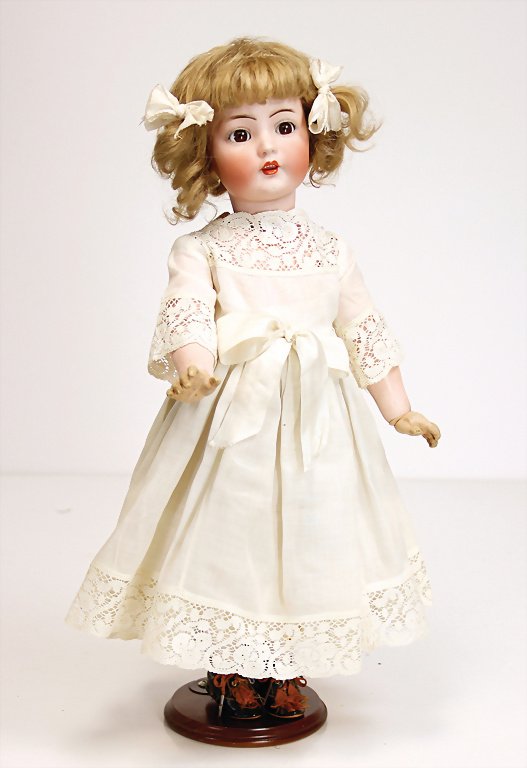 KÄMMER & REINHARDT 117N, 43 cm, brown impish eyes,: KÄMMER & REINHARDT 117N, 43 cm, brown impish eyes, opened mouth, teeth and tongue, old mohair wig, original toddler body, with pulled up knee joints and rubber hands, the crank body was unhandsome re