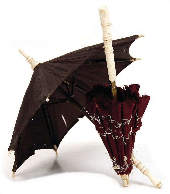 2 small doll's umbrella, handle and point are made of (1 of 1)