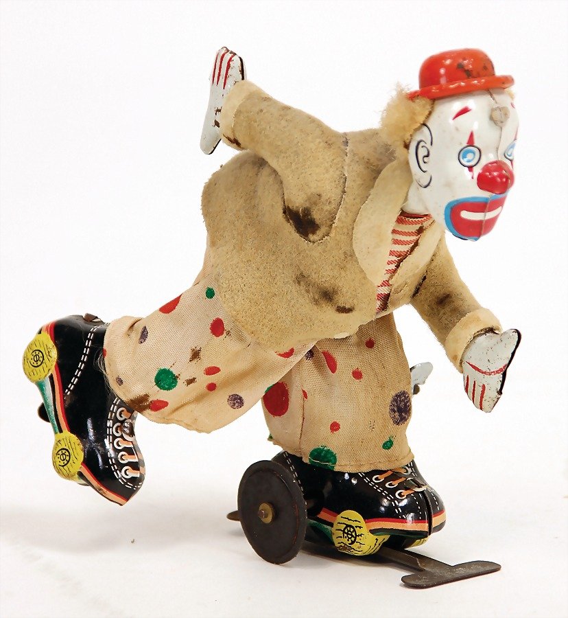 Clown auf Rollschuhen, Blech lithogr., Bekleidung (1 of 1)