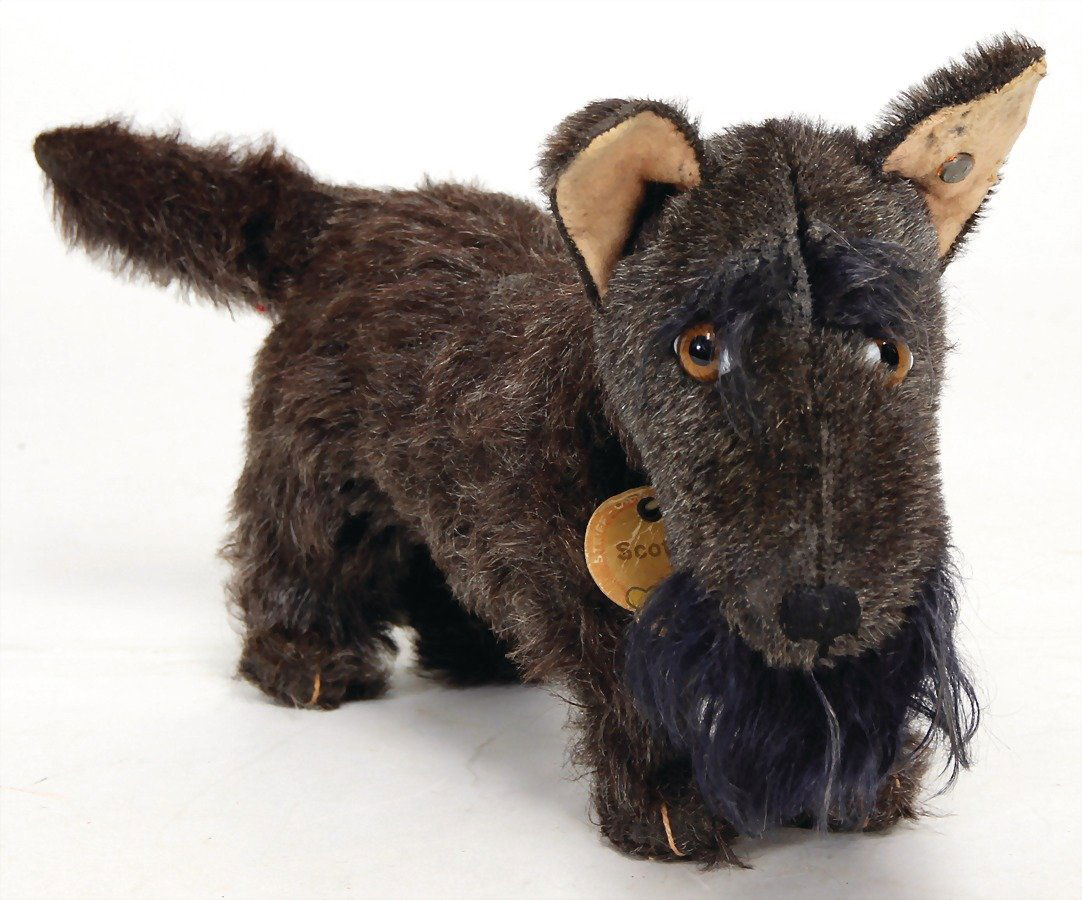 STEIFF Scotty, 32 cm, with button, rests of the red (1 of 2)
