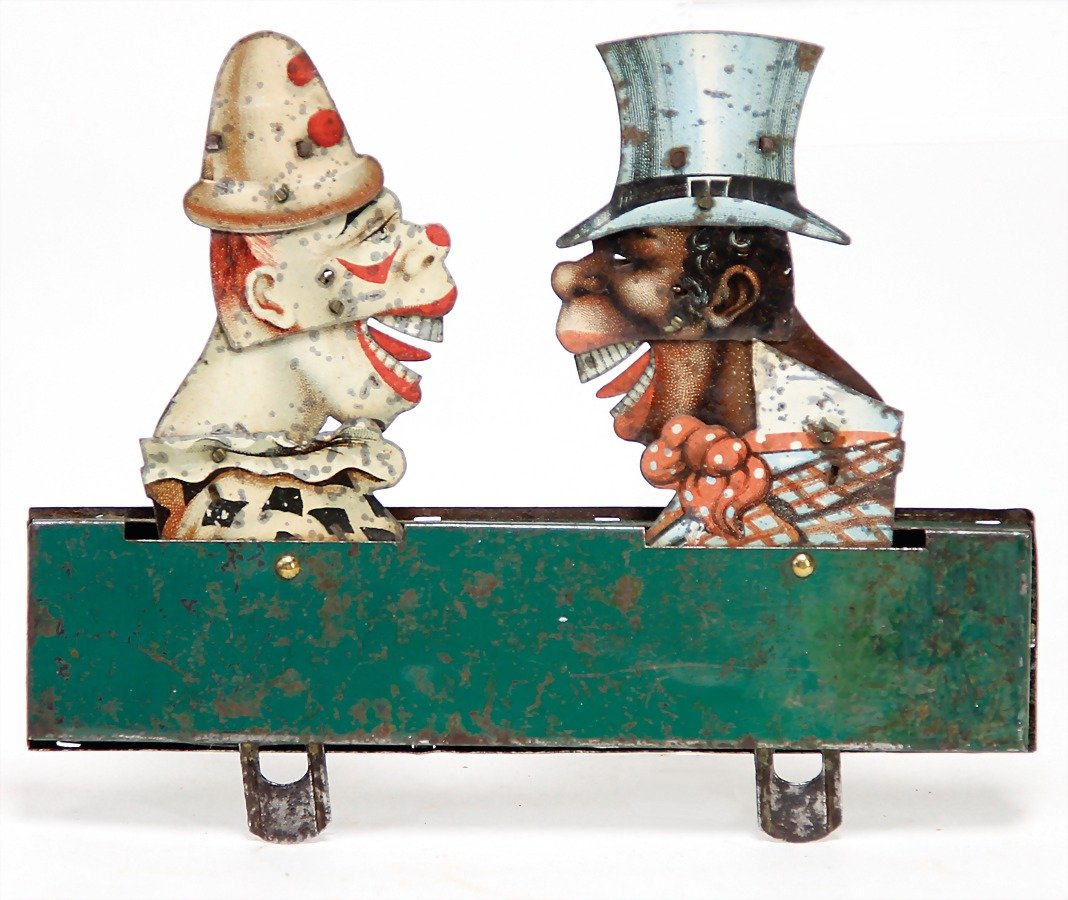 2 sheet metal caricature figures, colored man with top (1 of 1)