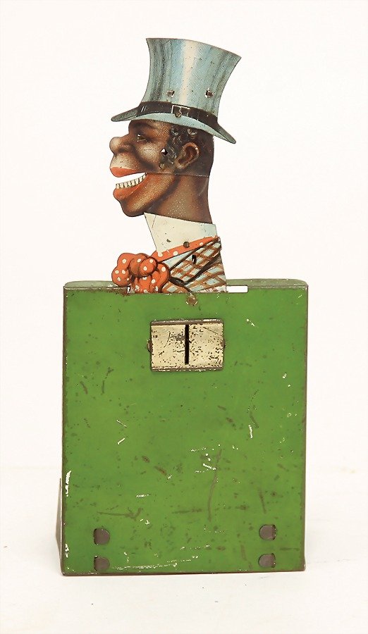 colored figure with topper, movable jaw, lithographed (1 of 1)