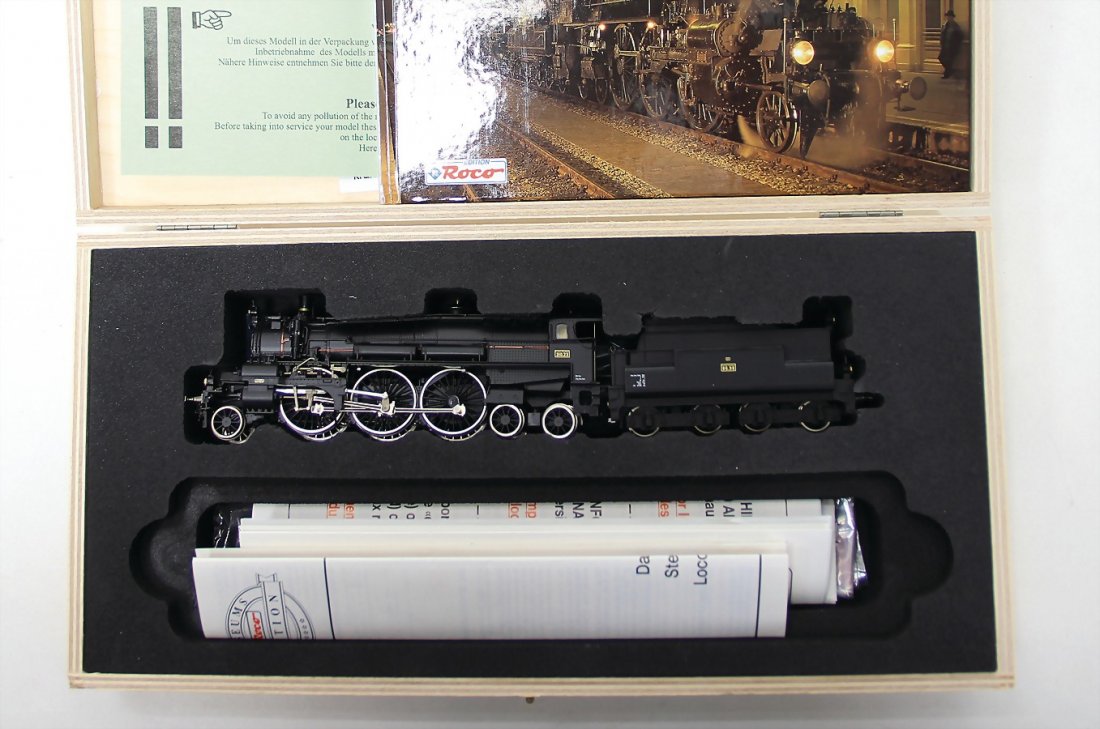 ROCO Museumsedition, H0, 1C2, "Die: ROCO Museumsedition, H0, 1C2, "Die Dampflokomotive" 310.23, unbespielt, Orig.-Holzschatulle, neuwertig, mit Zubehör German Description ROCO Museumsedition, H0, 1C2, "Die Dampflokom