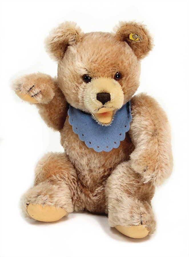 STEIFF bear, sitting, with button and rests of the (1 of 1)