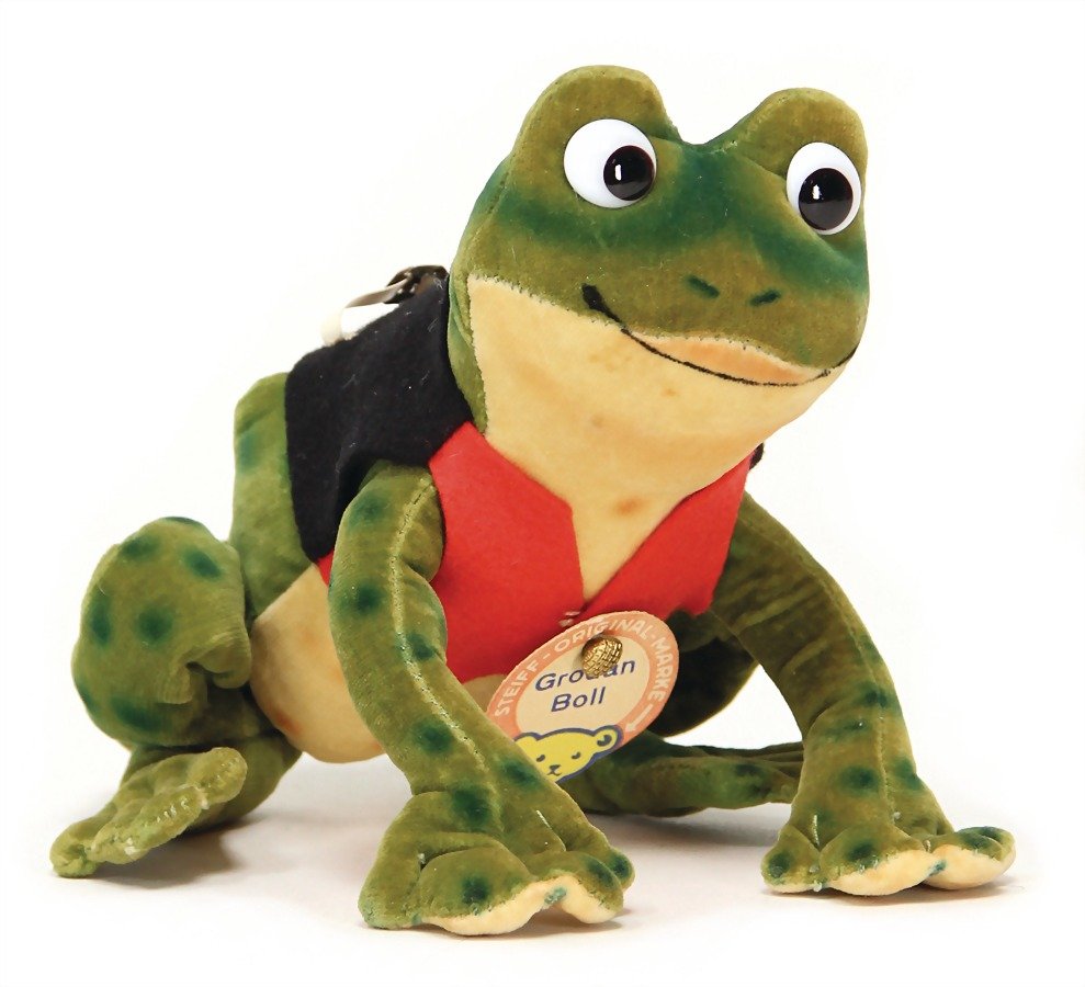STEIFF Grodan Boll, toad, title character from a Danish: STEIFF Grodan Boll, toad, title character from a Danish children's story (together with Kalle Stropp, Pos.129), sitting, black/red felt vest, 14 cm, produced 1956, with button and breast sign, very go