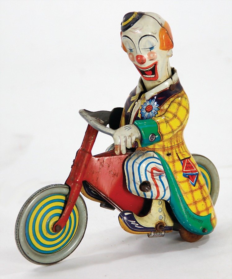 TECHNOFIX clown on wheel, lithographedsheet metal, 13.5 (1 of 1)