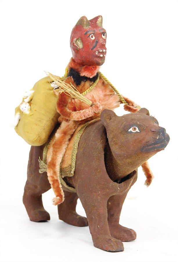 Krampus riding on a bear, with bag filled with (1 of 1)