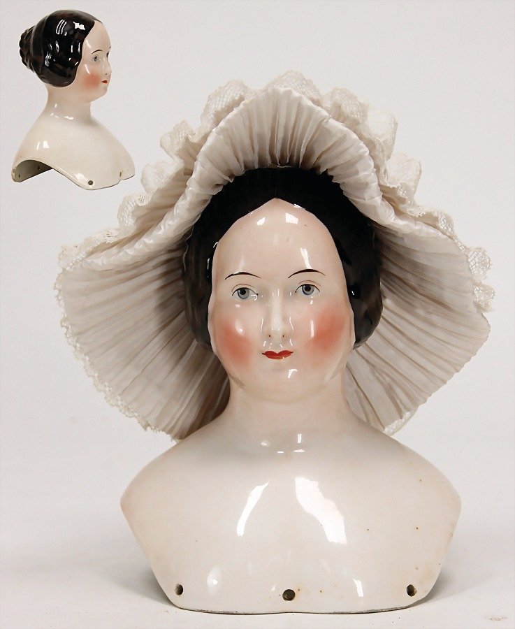 BIEDERMEIER enameled shoulder headed doll, painted: BIEDERMEIER enameled shoulder headed doll, painted eyes, closed mouth, nice modelled hairstyle, breast plate with a diameter of 15 cm, height c. 19 cm German Description BIEDERMEIER glasierter Brustbl