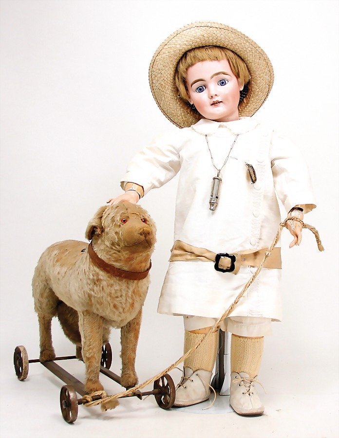doll with porcelain head, marked 306 DEP 17, blue fix: doll with porcelain head, marked 306 DEP 17, blue fix inset paperweight-eyes, opened mouth, teeth, pierced ears, real hair wig, on a jointed wood/mass body, legs and armswith some holes that are cause